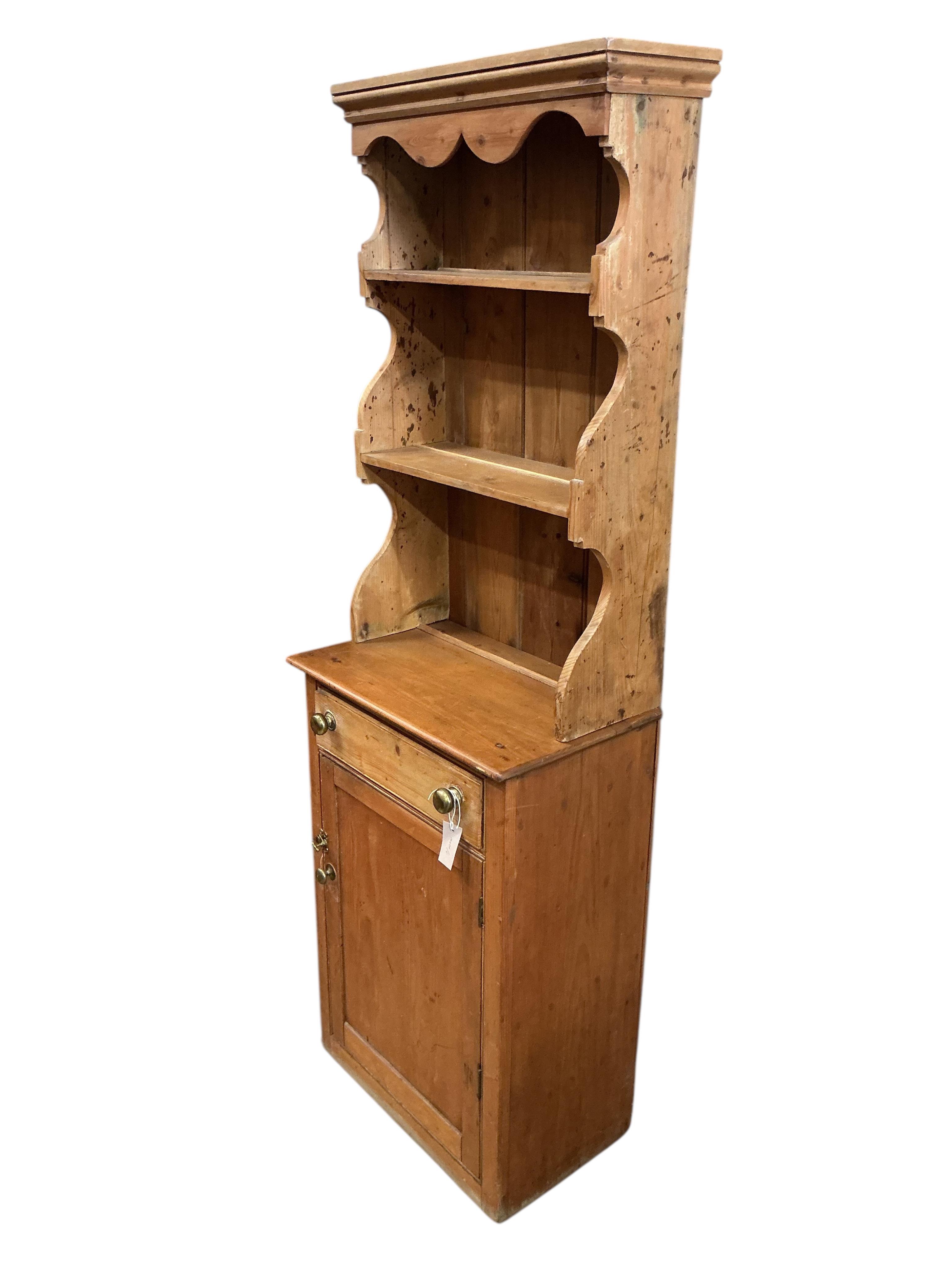 A small Victorian style pine dresser, width 59cm, depth 36cm, height 179cm
